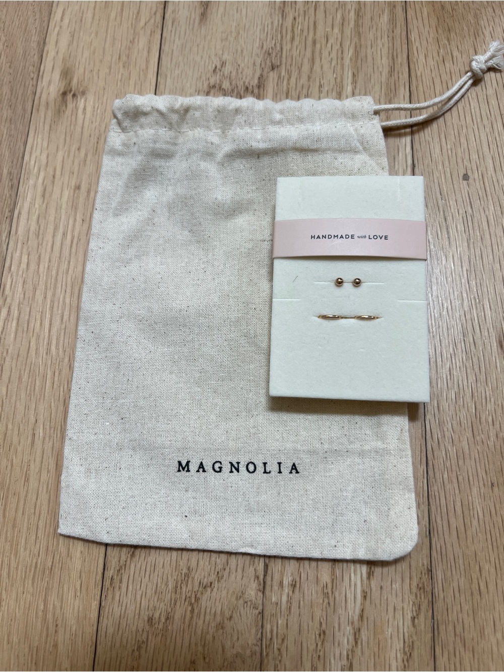 Magnolia gold-filled earring set featuring minimalist stud and hoop earrings